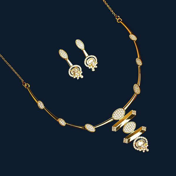 Gold necklace and earrings on a red background with decorative leaves.