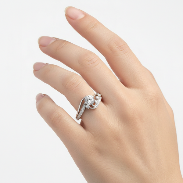 Silver ring with a diamond on a white background