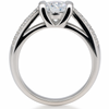 Silver ring with a heart-shaped diamond on a white background