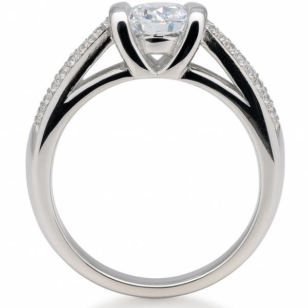Silver ring with a heart-shaped diamond on a white background