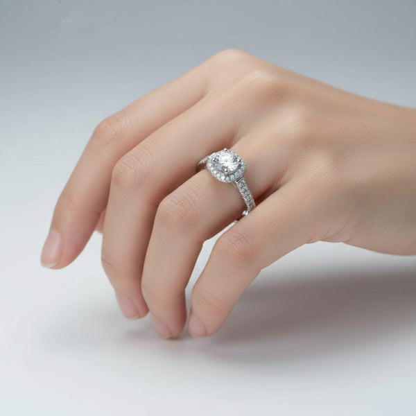 Silver ring with a diamond on a light gray background