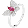 Silver butterfly ring with a pink gemstone on a white background