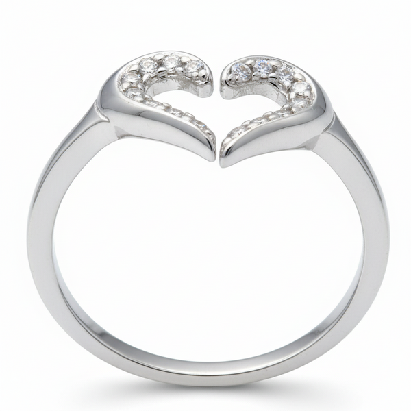 Silver ring with two diamonds on a gray background