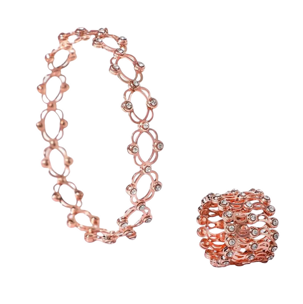 Rose gold bracelet and ring set on a white background
