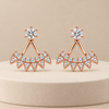 Earrings on a cream display