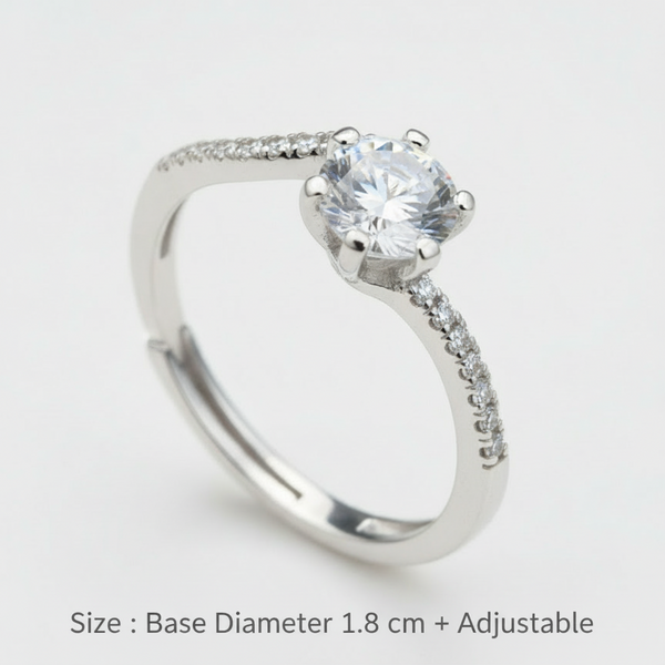 Silver ring with a large diamond on a white background