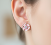 Tiny Pink Flower Stud Under 3mm on Right Ear