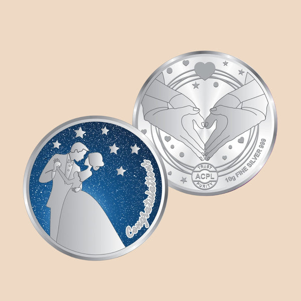 Silver coin with romantic design on a white and purple background