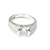 Silver ring with a large central gemstone and smaller stones on the band against a white background