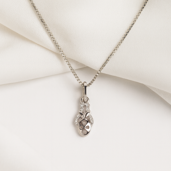 Silver necklace with a pendant on a white background