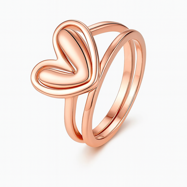 Rose gold heart-shaped ring on a white background