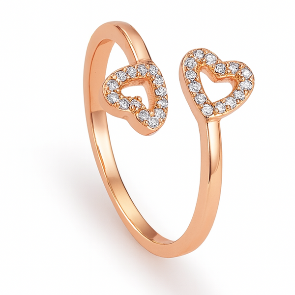 Rose gold ring with heart designs on a white background