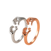 Two rings, one silver and one rose gold, on a beige background with 'Hug Your Style' text.