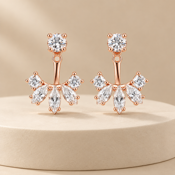 Earrings on a cream display