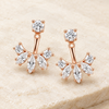 Earrings on ivory stone