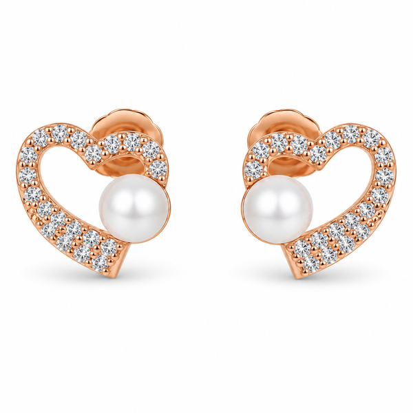 Heart-and-pearl earring pair on white