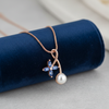 Necklace on Navy Velvet Jewelry Roll