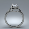 Silver ring with a diamond on a gray background