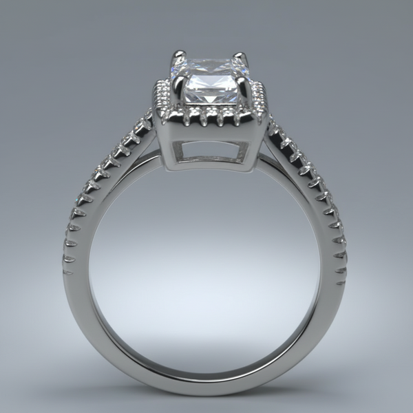 Silver ring with a diamond on a gray background
