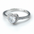 Silver ring with a heart-shaped diamond on a white background